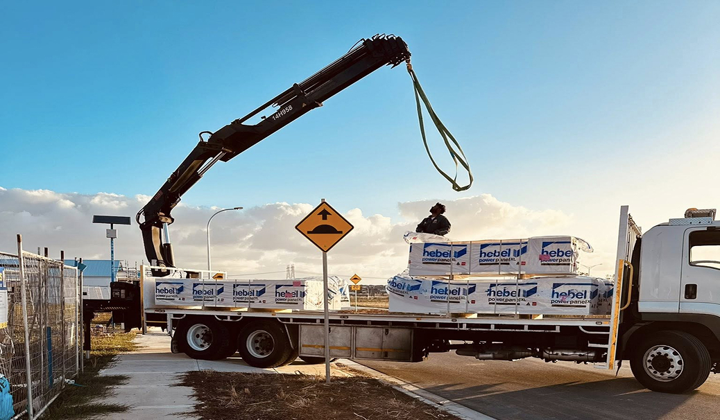 Crane truck delivering Hebel AAC panels