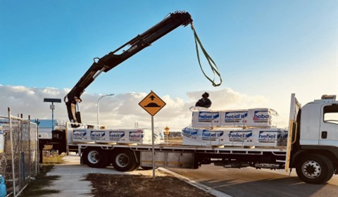 Crane truck delivering Hebel AAC panels